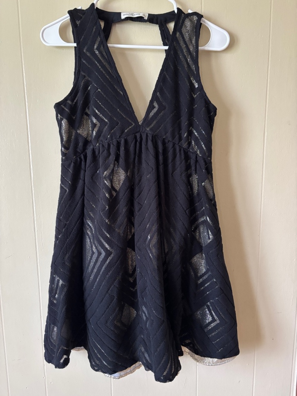 Abercrombie & Fitch Black dress with Racerback and gold underlayer. size sm/med